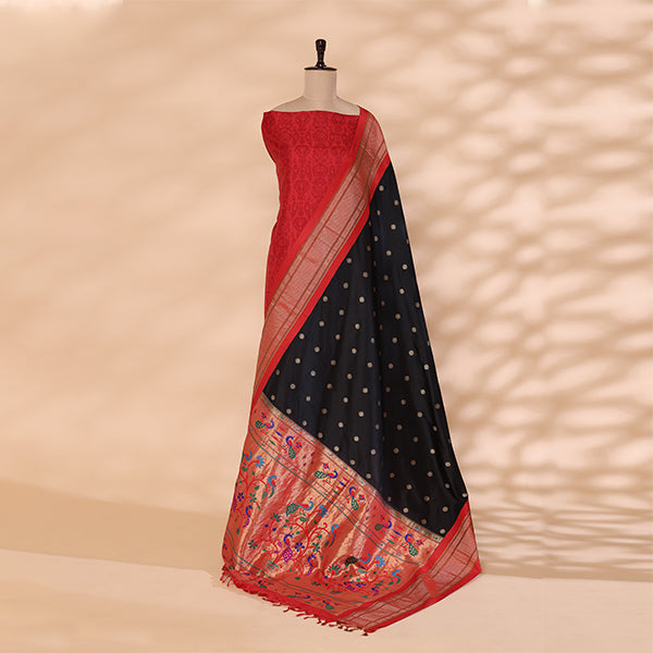Pure Banarasi silk unstitched suit featuring a strawberry blush base displayed on a mannequin with a premium slate grey and golden Paithani dupatta.