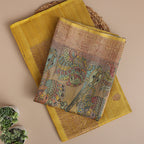 Close-up shot of the premium sunlit yellow handwoven pure Banarasi silk dress material showcasing its authentic handloom weave structure.