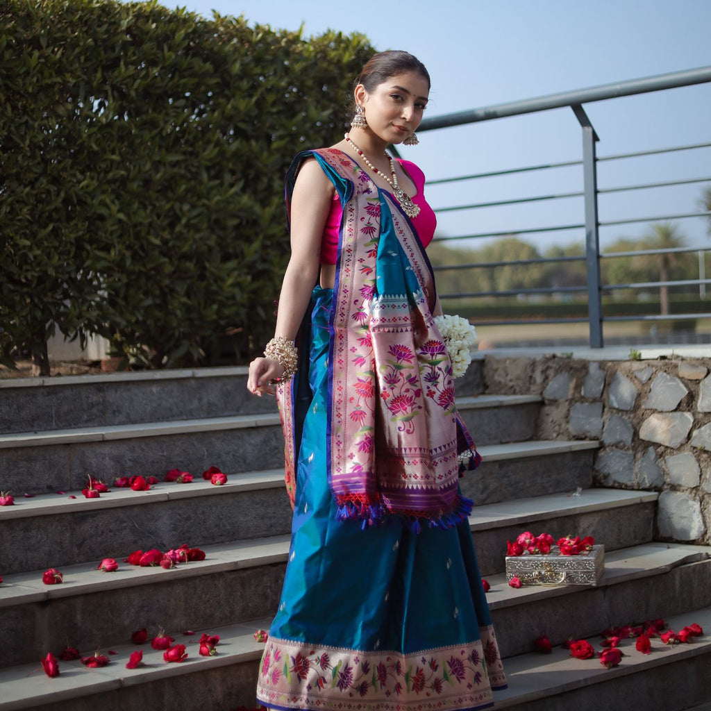 Teal blue Paithani saree with classic design for festive and wedding occasions