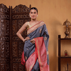 Close-up of the 1-meter unstitched pure silk blouse fabric featuring a matching border included with the Twilight Radiance saree.