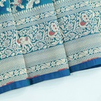 Full layout view of the handwoven Blue Azure Shikargah Katan Silk Saree displaying its exquisite craftsmanship and rich color contrast.