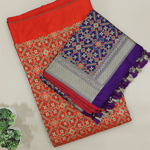 Detailed view of the vibrant sunset spectrum carrot red multicoloured dupatta showcasing traditional Patola and Banarasi handloom craftsmanship.