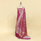 Luxurious drape of the unstitched pure Banarasi silk festive suit material showcasing the rich texture and premium fabric quality.