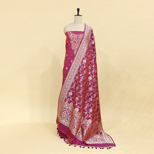 Luxurious drape of the unstitched pure Banarasi silk festive suit material showcasing the rich texture and premium fabric quality.